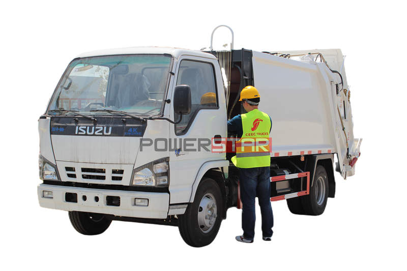Isuzu 600P garbage compactor truck