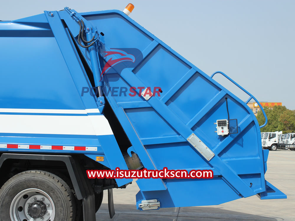 Isuzu compactor trash truck
