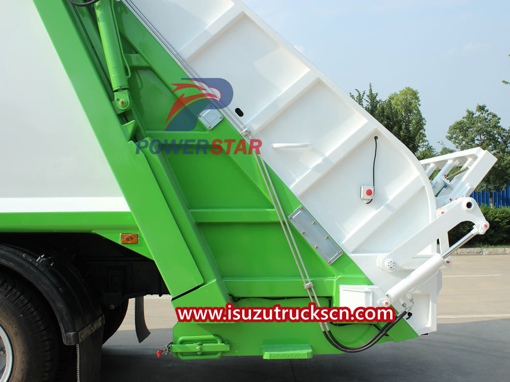 Isuzu FTR dumpster compactor truck