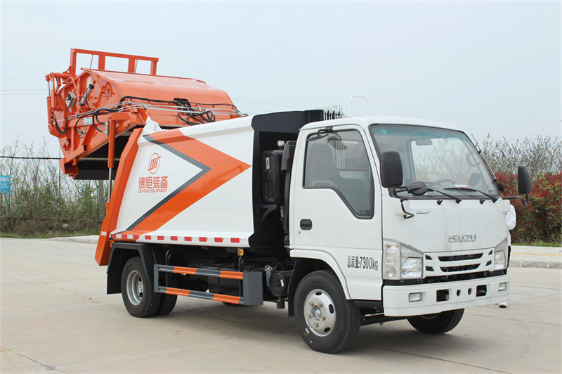 Isuzu NKR refuse compactor truck