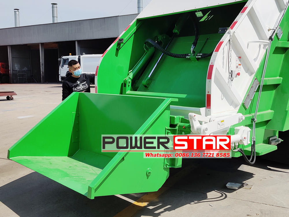 Isuzu rear end loading garbage truck