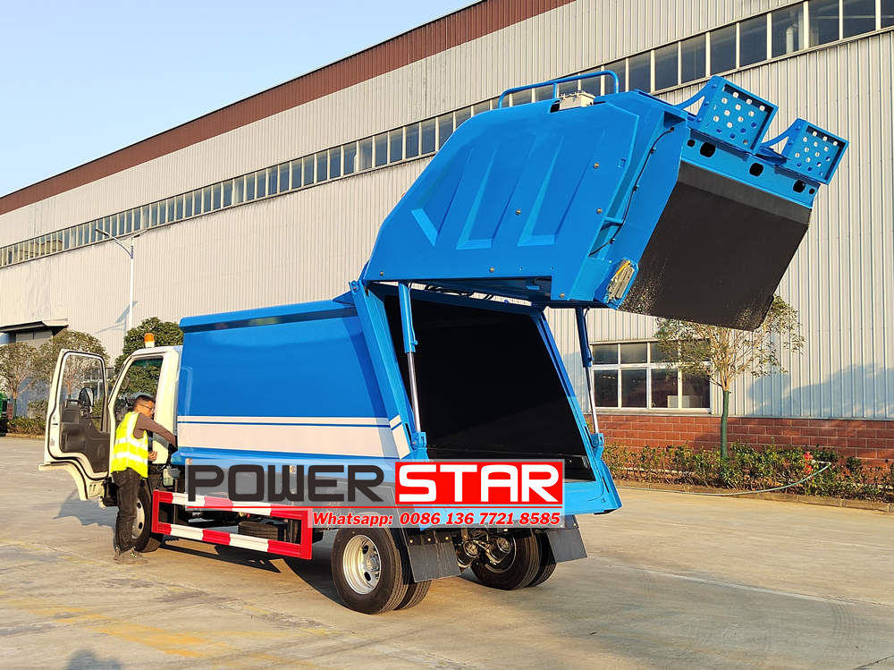 Isuzu rear end loading garbage truck