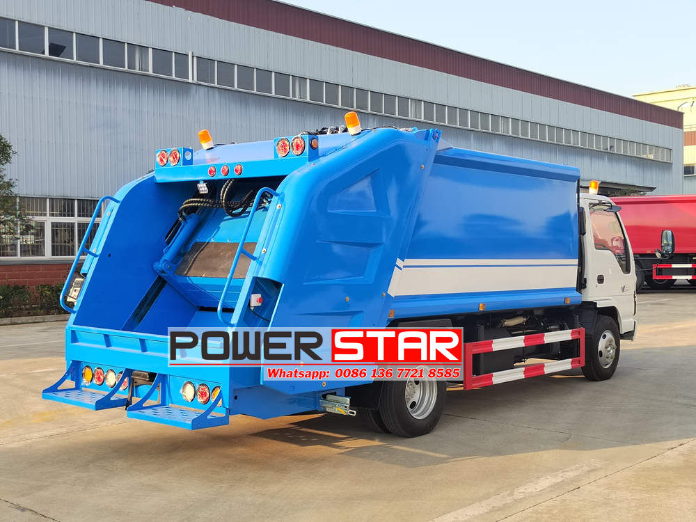 Isuzu trash compactor truck