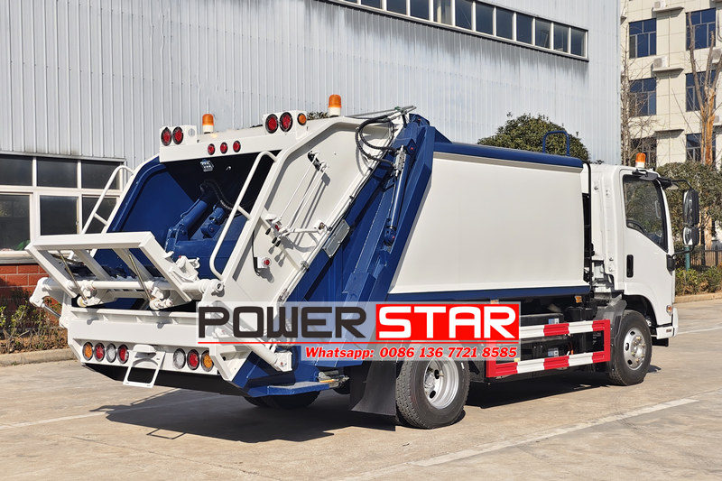 Isuzu trash compactor truck