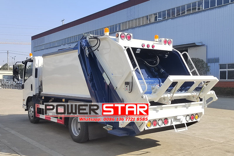 Isuzu rear loader compactor truck
