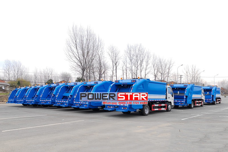 Isuzu trash compactor truck