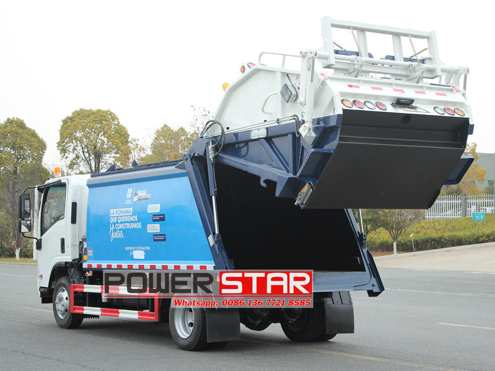 Isuzu trash compactor truck