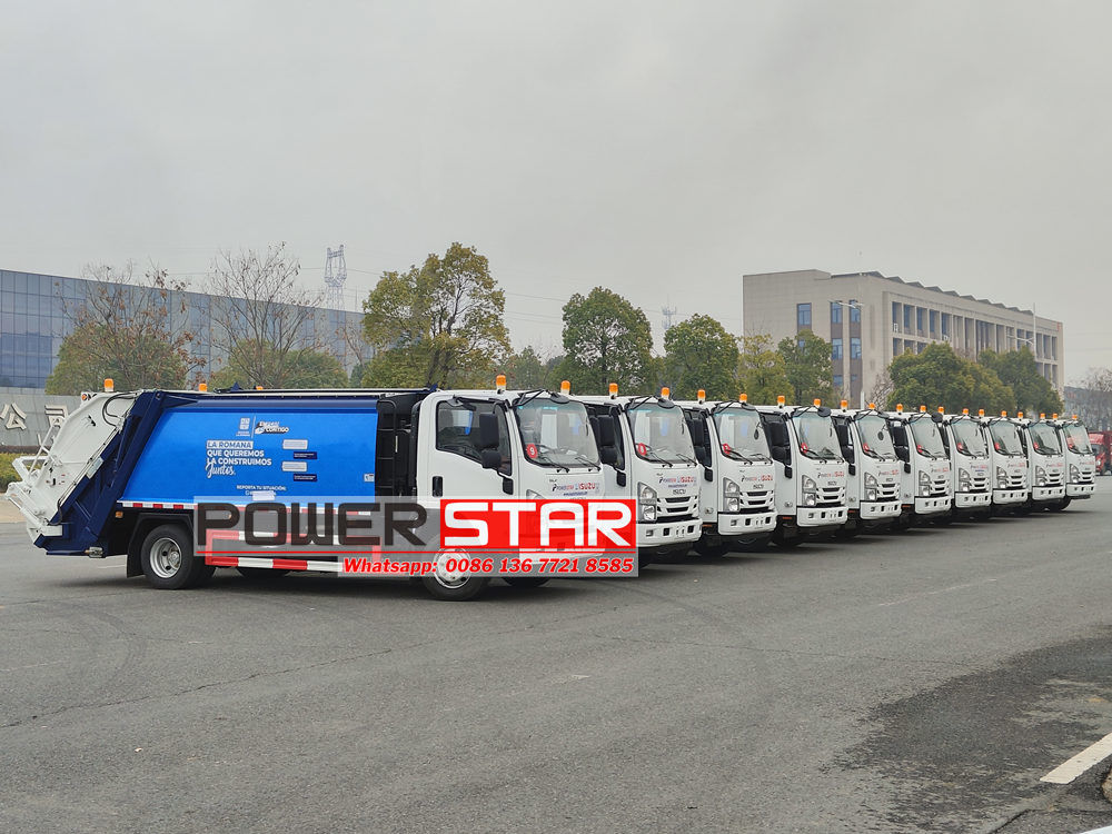 Isuzu rear loader compactor truck