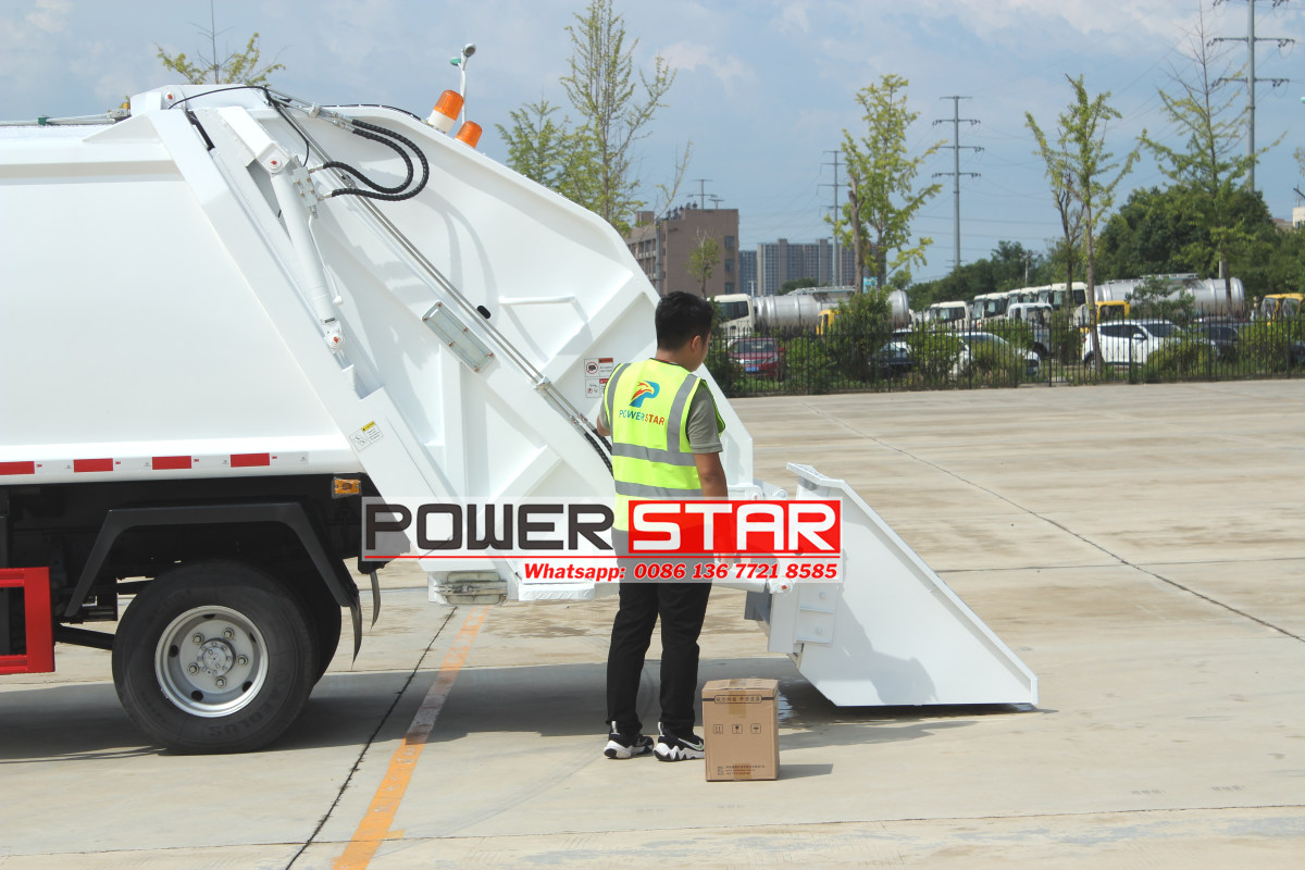 New or used Isuzu waste compactor truck operating mode