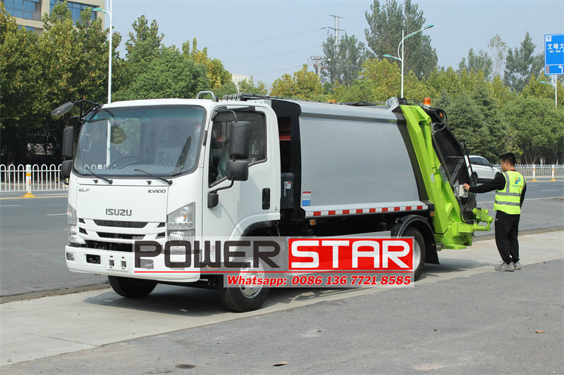 Isuzu refuse compactor truck