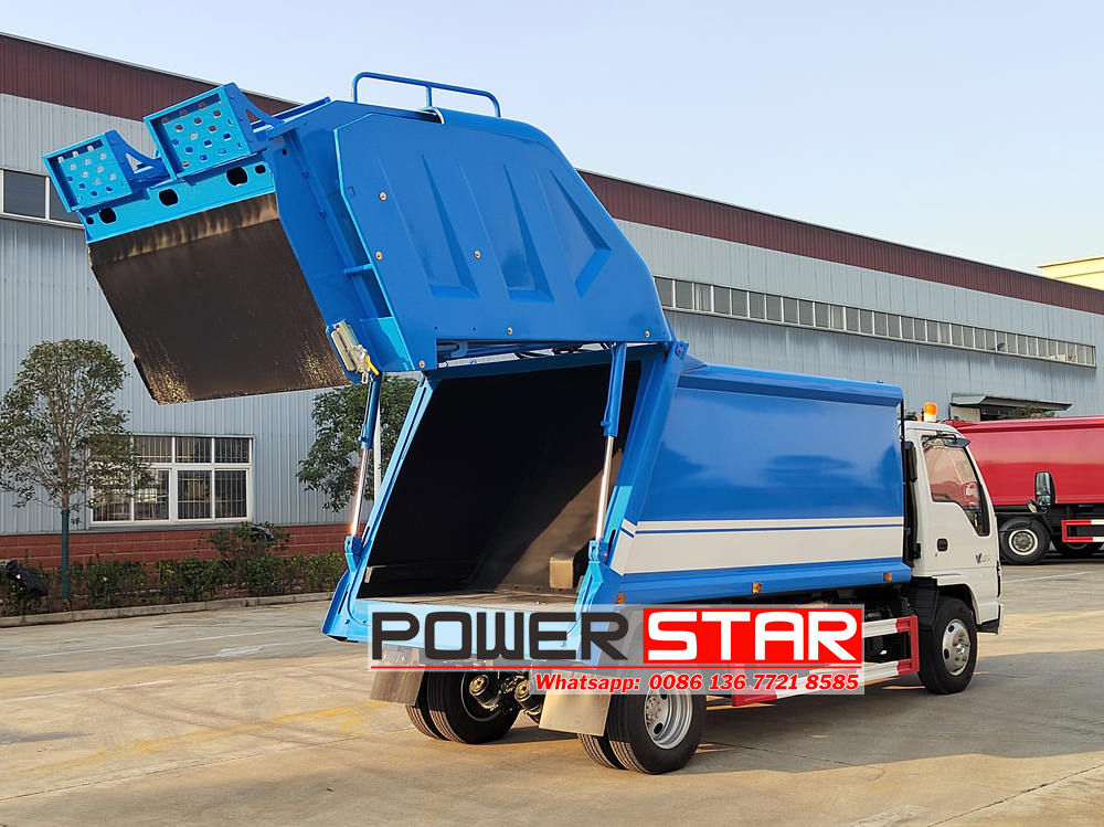 Isuzu rear loader compactor truck