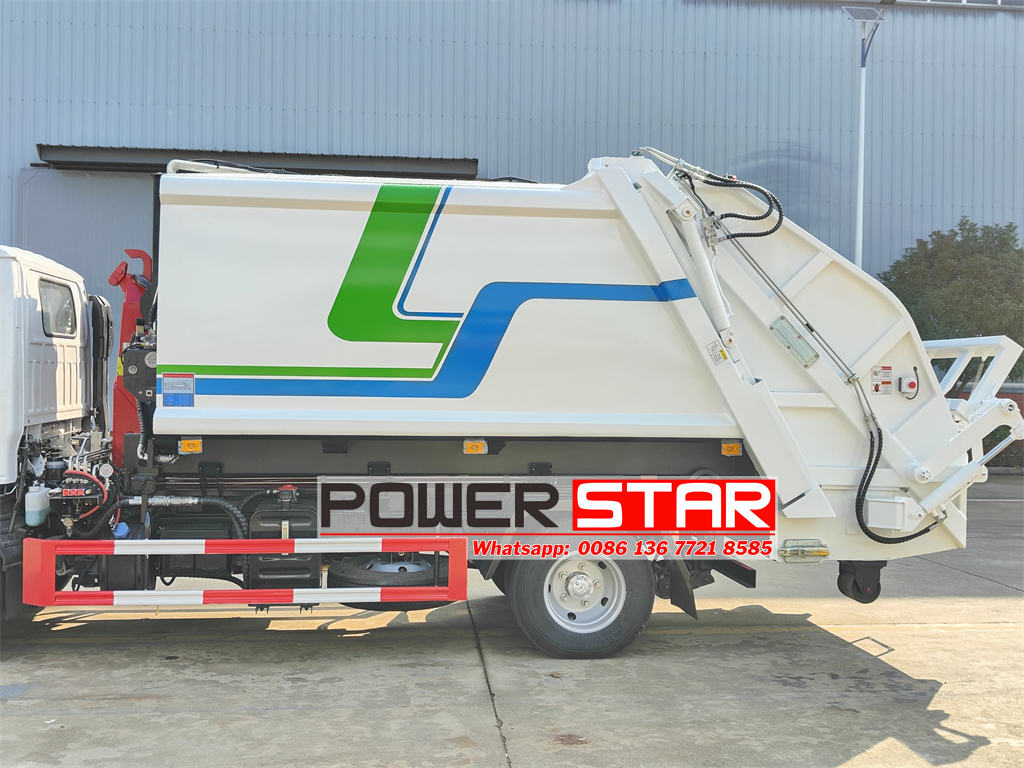 ISUZU hook lift with compactor body