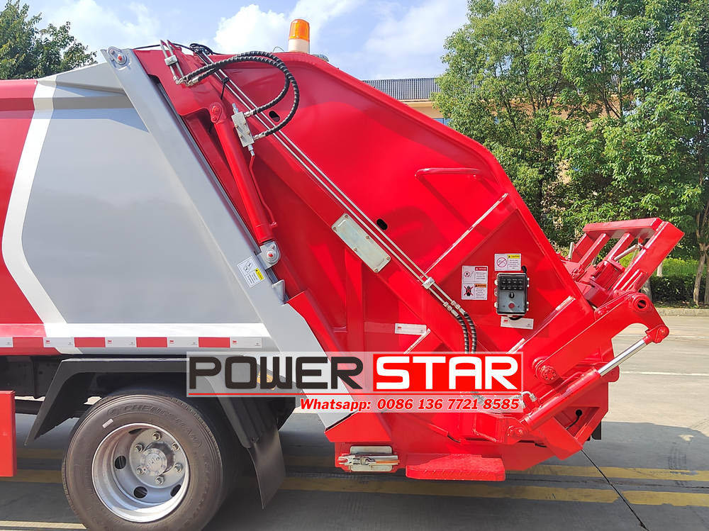 Isuzu rear load dumpster truck