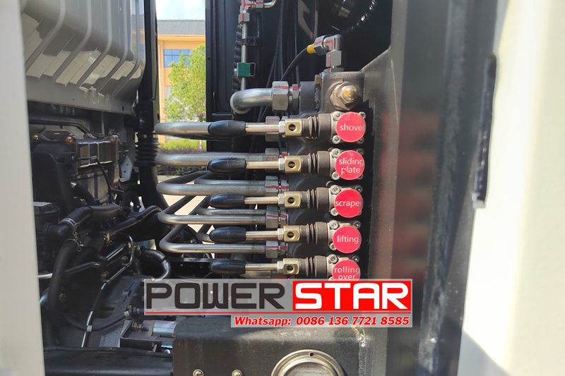 Isuzu trash compactor truck