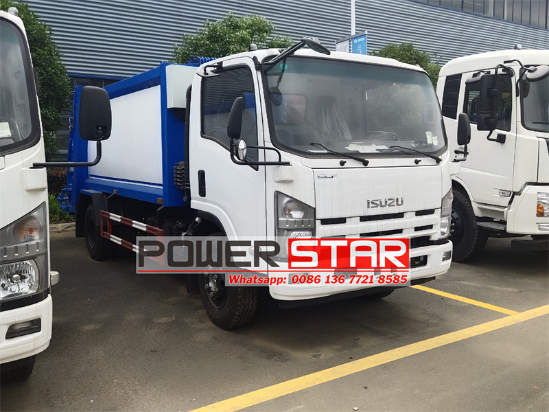 Isuzu rear end loader garbage truck
