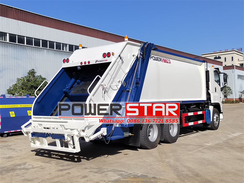 Isuzu rear loader refuse compactor truck