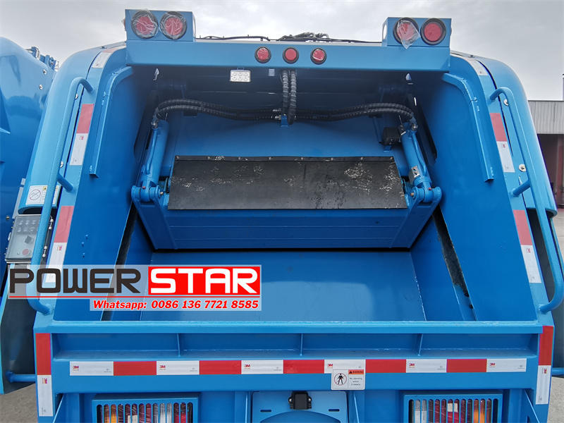 Isuzu ELF 600P rear loader garbage truck