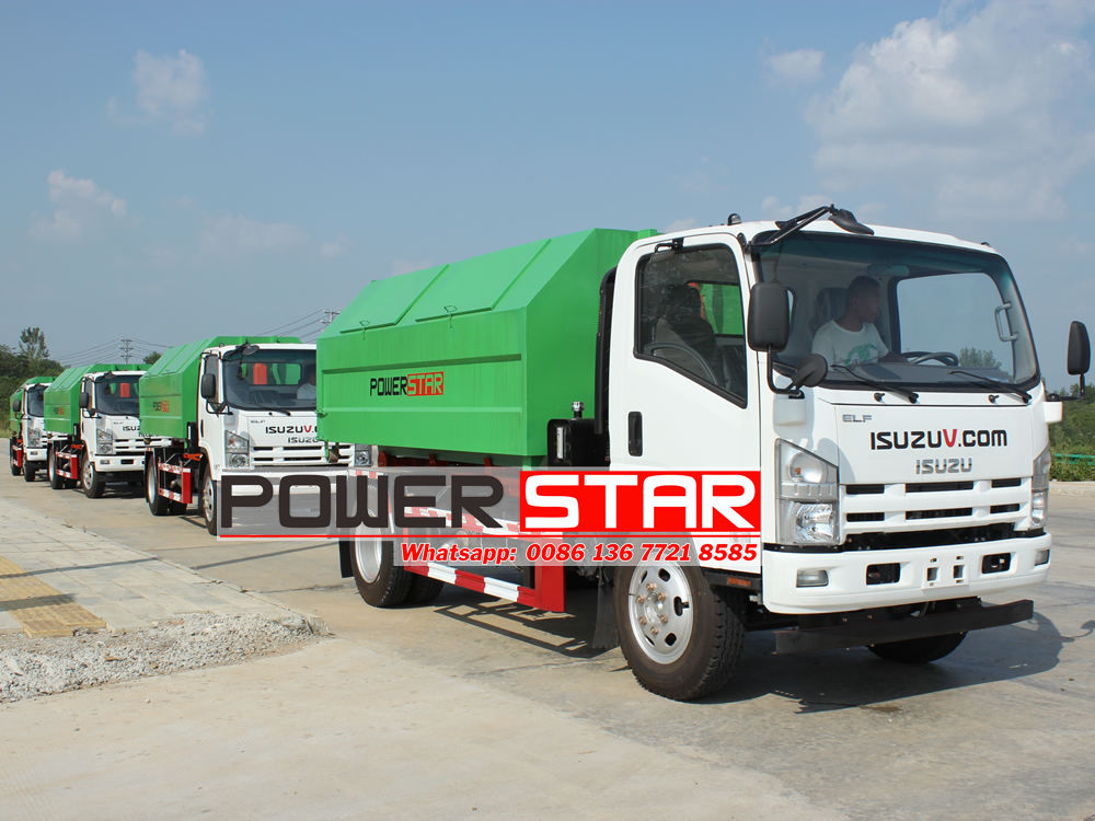 Isuzu hook arm garbage truck