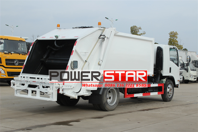 Isuzu refuse compactor truck with sleeper