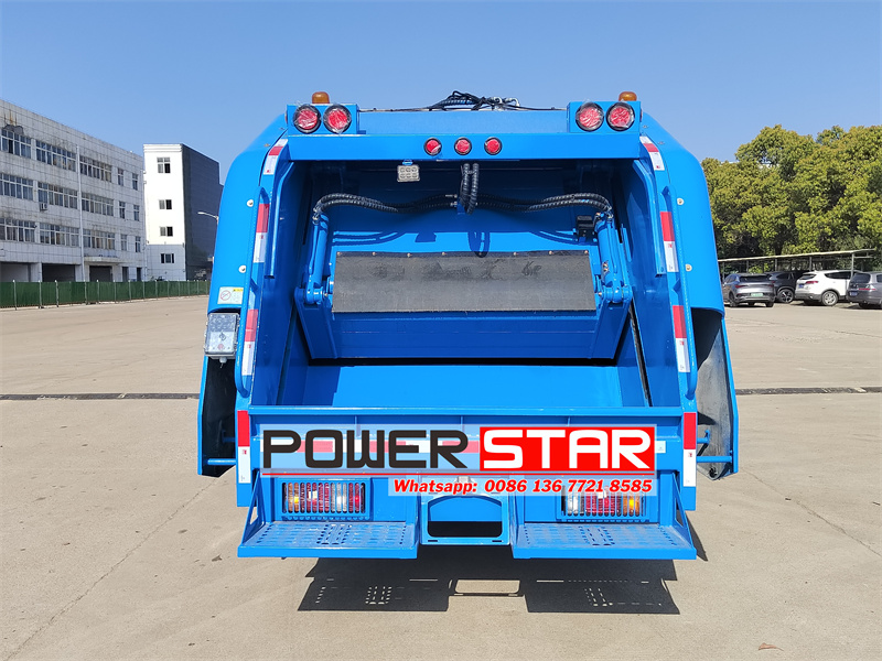 Isuzu ELF 600P rear loader garbage truck