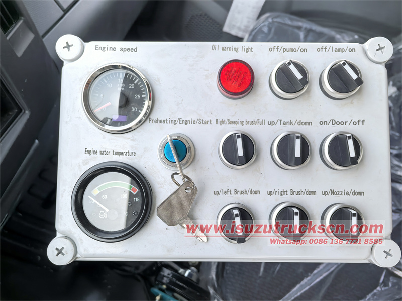 Isuzu FTR vacuum sweeper with brush