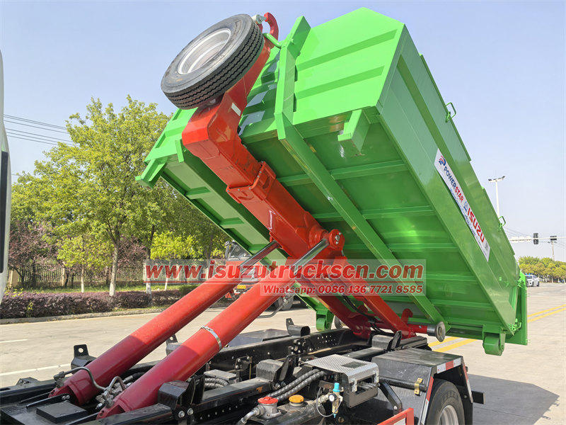 ISUZU NKR 6CBM hook loader for sale