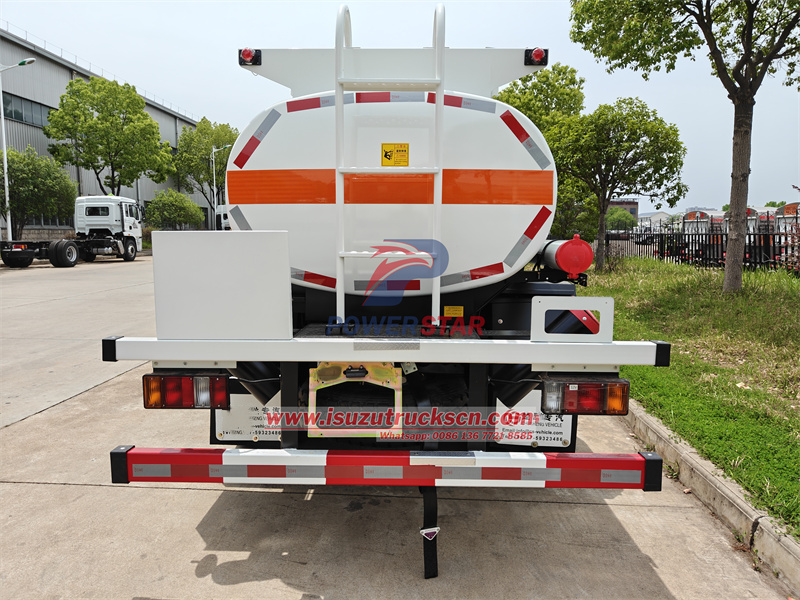 back view of  Isuzu fuel truck with climbing ladder