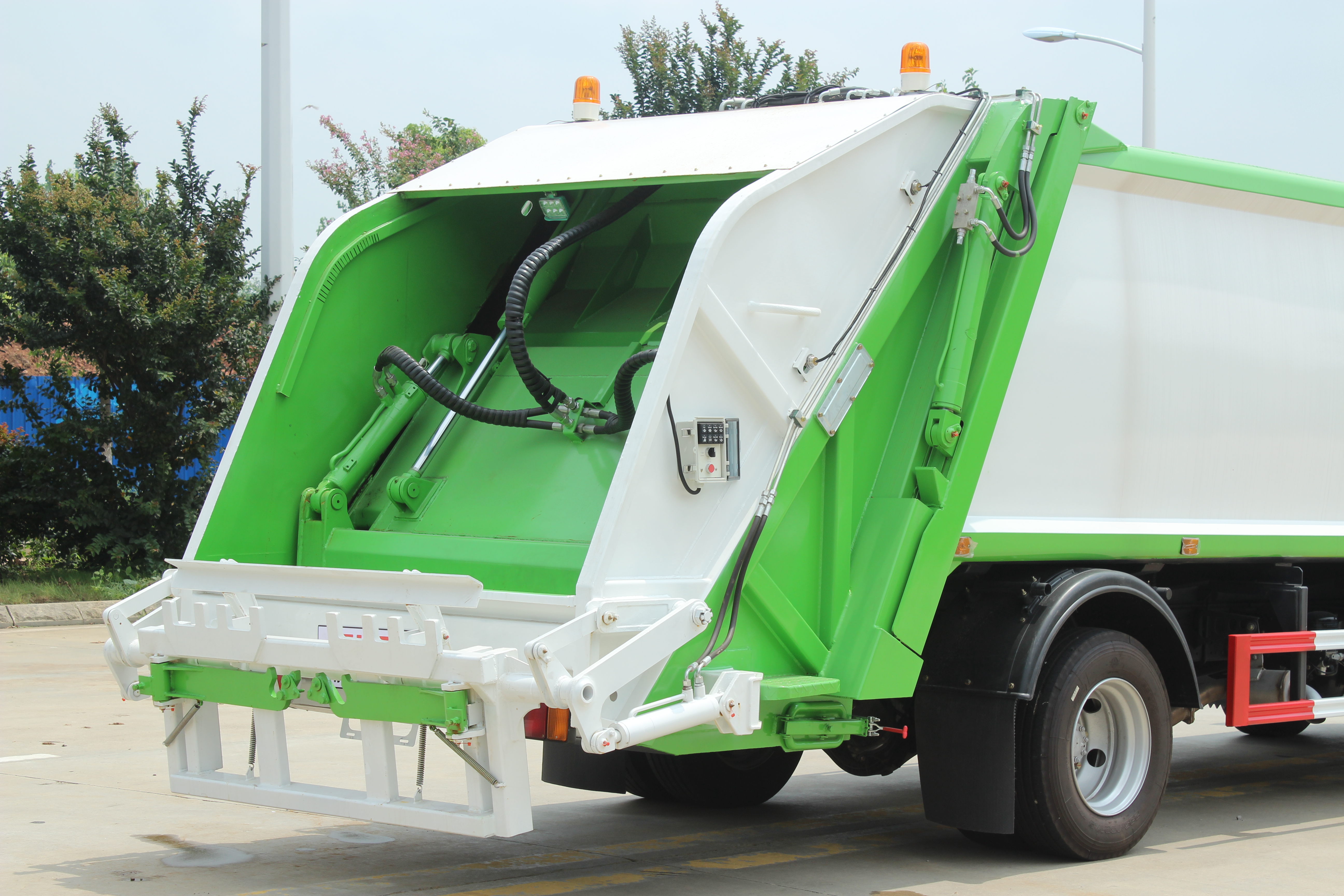 Tailgate lift, scraper, and slide plate cylinders