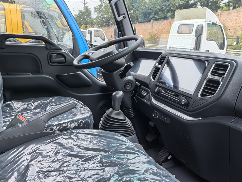 Isuzu ELF mini dropside cargo truck