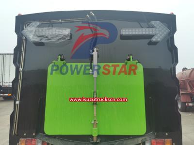 Isuzu Street sweeper combines water and brooms