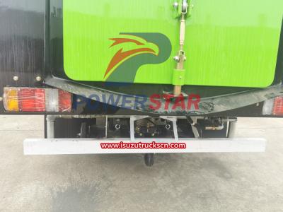Isuzu Street sweeper combines water and brooms