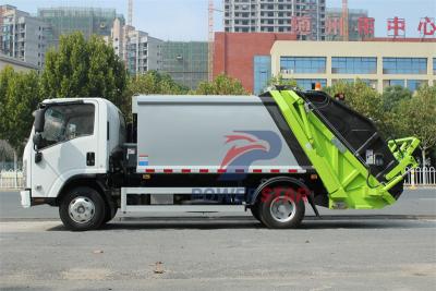 Isuzu truck with garbage compactor bodies