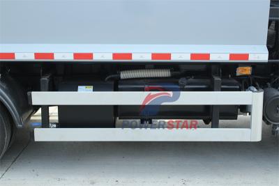 Isuzu truck with garbage compactor bodies