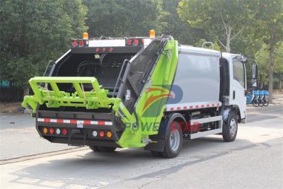 Isuzu truck with garbage compactor bodies