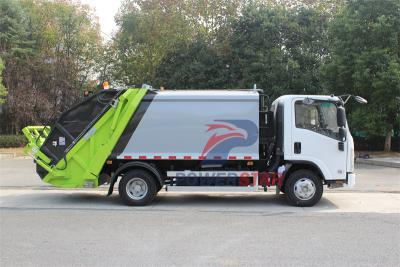 Isuzu truck with garbage compactor bodies