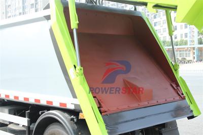 Isuzu truck with garbage compactor bodies