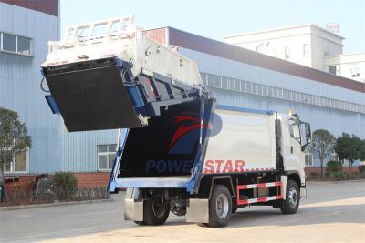 Isuzu GIGA truck with compactors