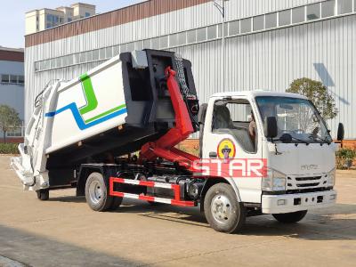 Isuzu 120HP hook lifter refuse compactor truck