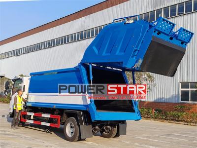 Isuzu NPR recycling rear loader garbage truck