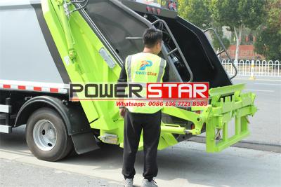 Year 2025 new Isuzu NPR 6cbm solid waste compactor truck