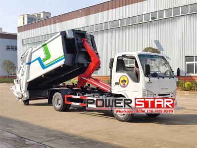 Isuzu 7 cbm hook lift with garbage compactor