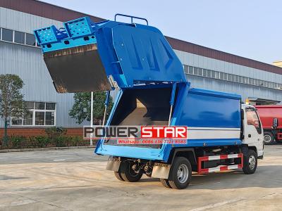 ISUZU NKR chassis trash compactor truck for sale