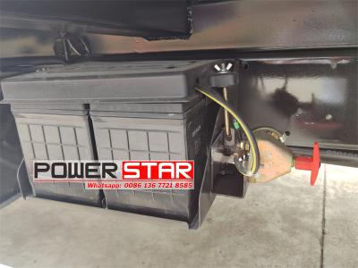 Isuzu 700P dumpster compactor truck