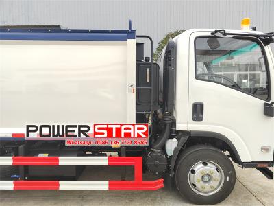 Isuzu 700P dumpster compactor truck