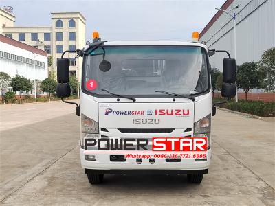 Isuzu 700P dumpster compactor truck