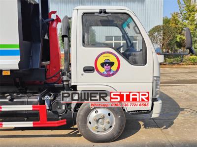 ISUZU NKR hook loader with garbage compactor