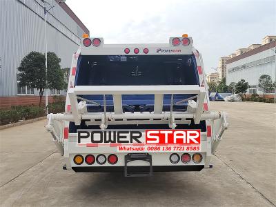 Isuzu 700P dumpster compactor truck