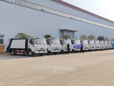 Isuzu 700P dumpster compactor truck