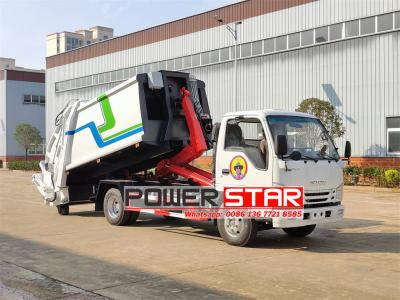 ISUZU NKR hook loader with garbage compactor