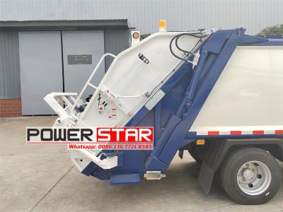 Isuzu 700P dumpster compactor truck